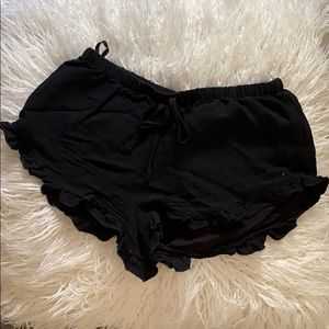 black ruffle shorts
